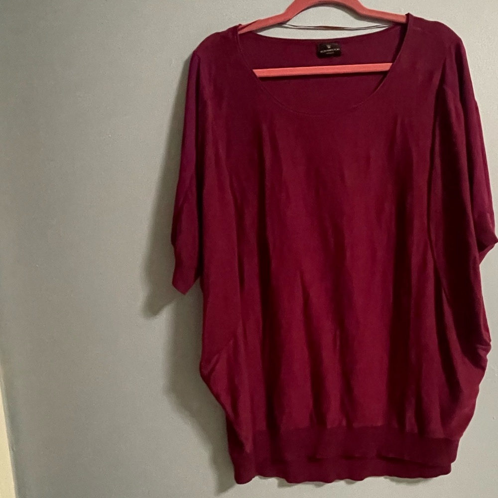 Pink, large sleeve three-quarter length sweater. Light fabric